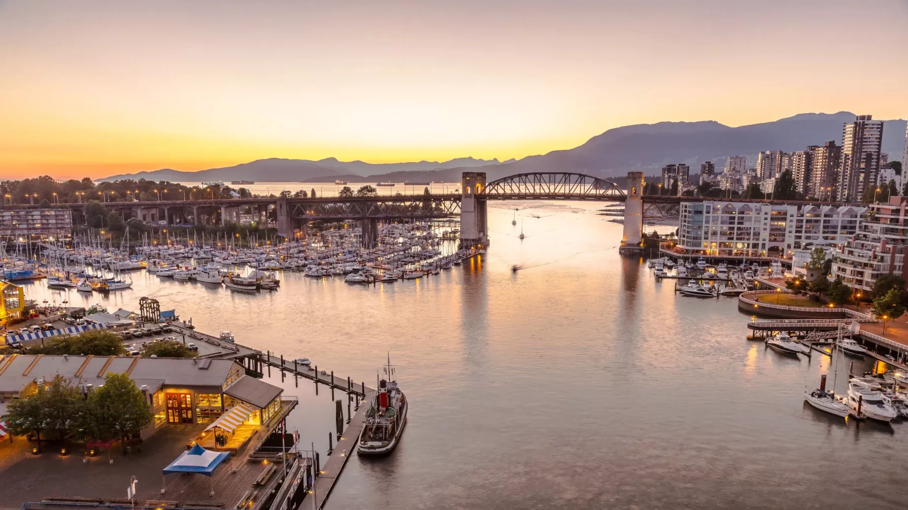 sunset over granville island near freedom boat club north vancouver